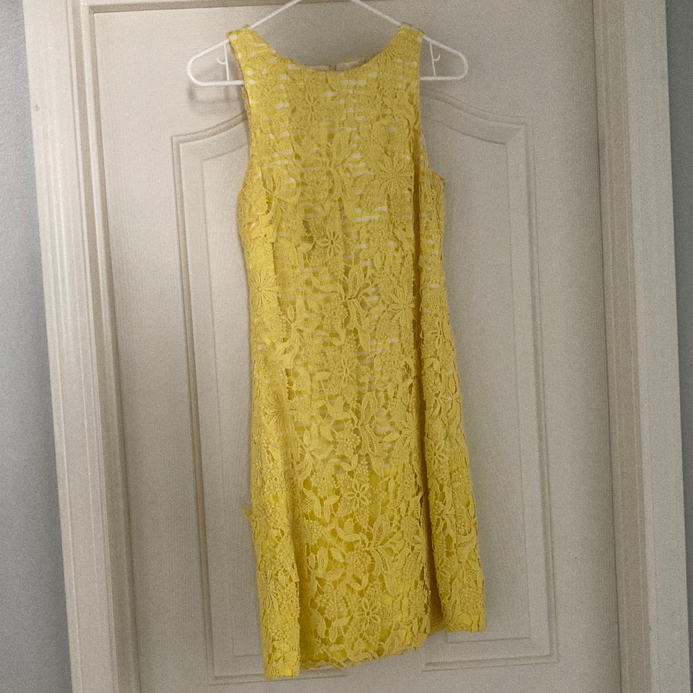 Phoebe Couture yellow mini dress with stripes and flowers.